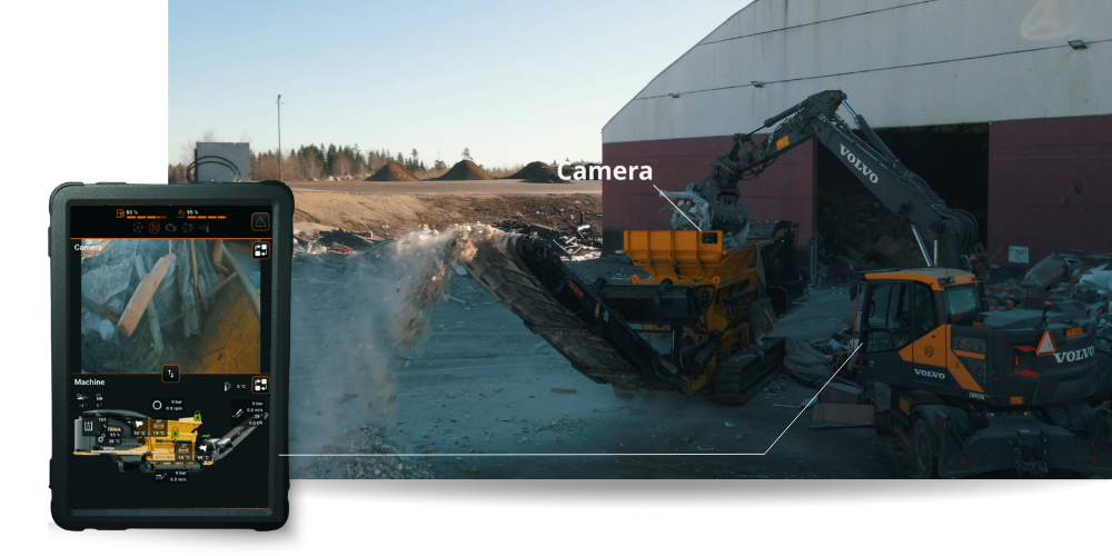 Tana Wingman operator interface for TANA D series shredders showing live hopper camera feed and real-time machine information on a tablet at a waste recycling site.